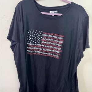 Maurices Black Short Sleeve Tee with Red & White Flag Text